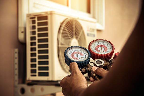 Professional Heat Pump Repair technician working in Oxford, PA